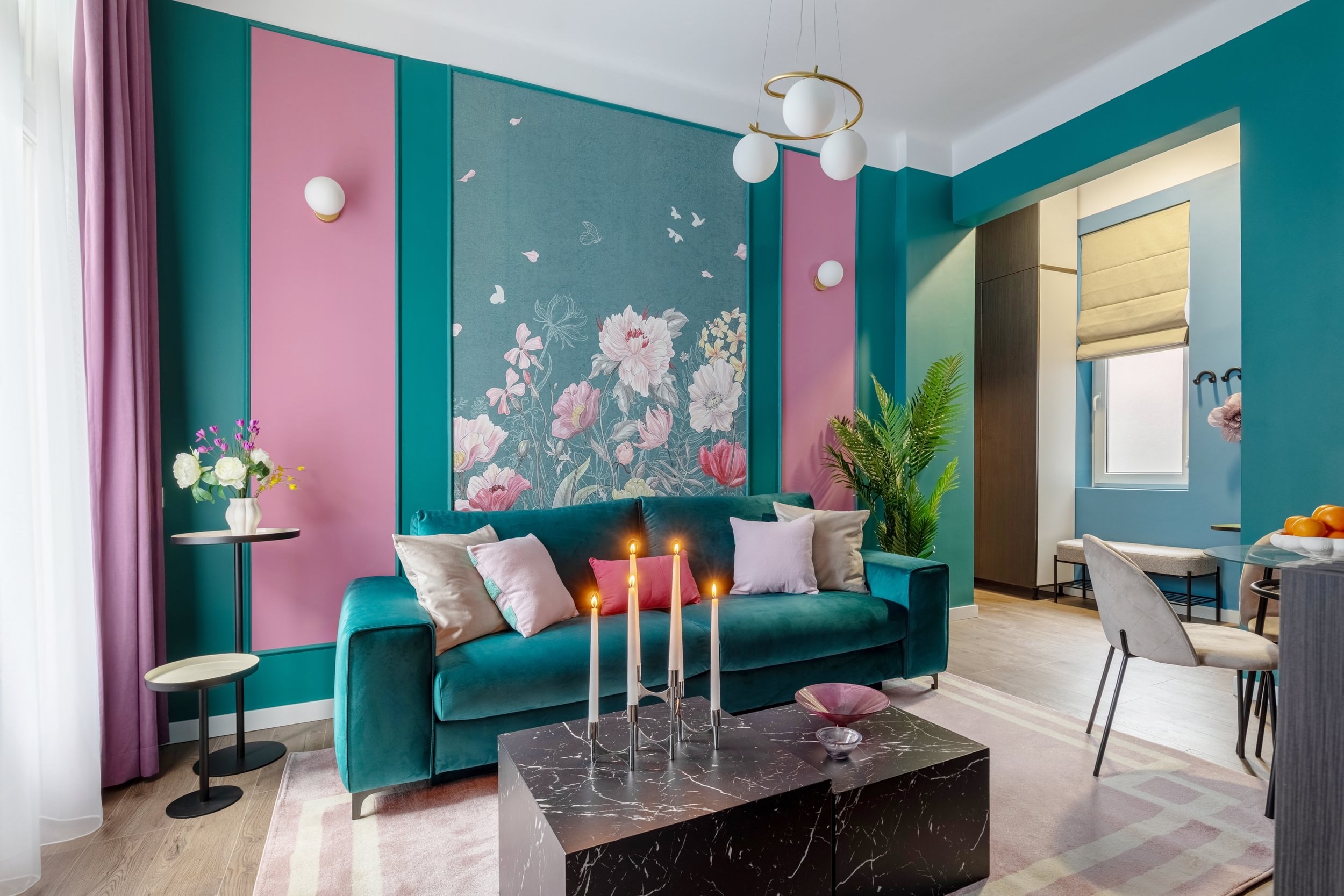 Teal and pink living room in a Bucharest apartment