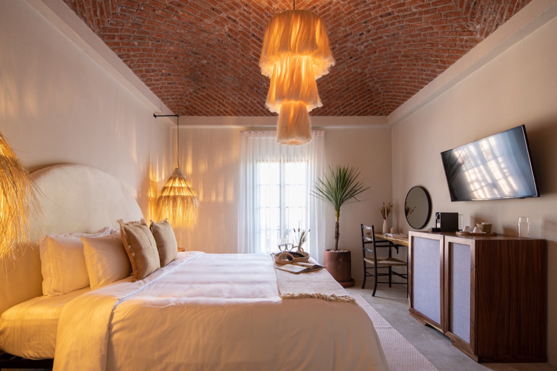 Bedroom under a brick vaulted ceiling in San Miguel de Allende