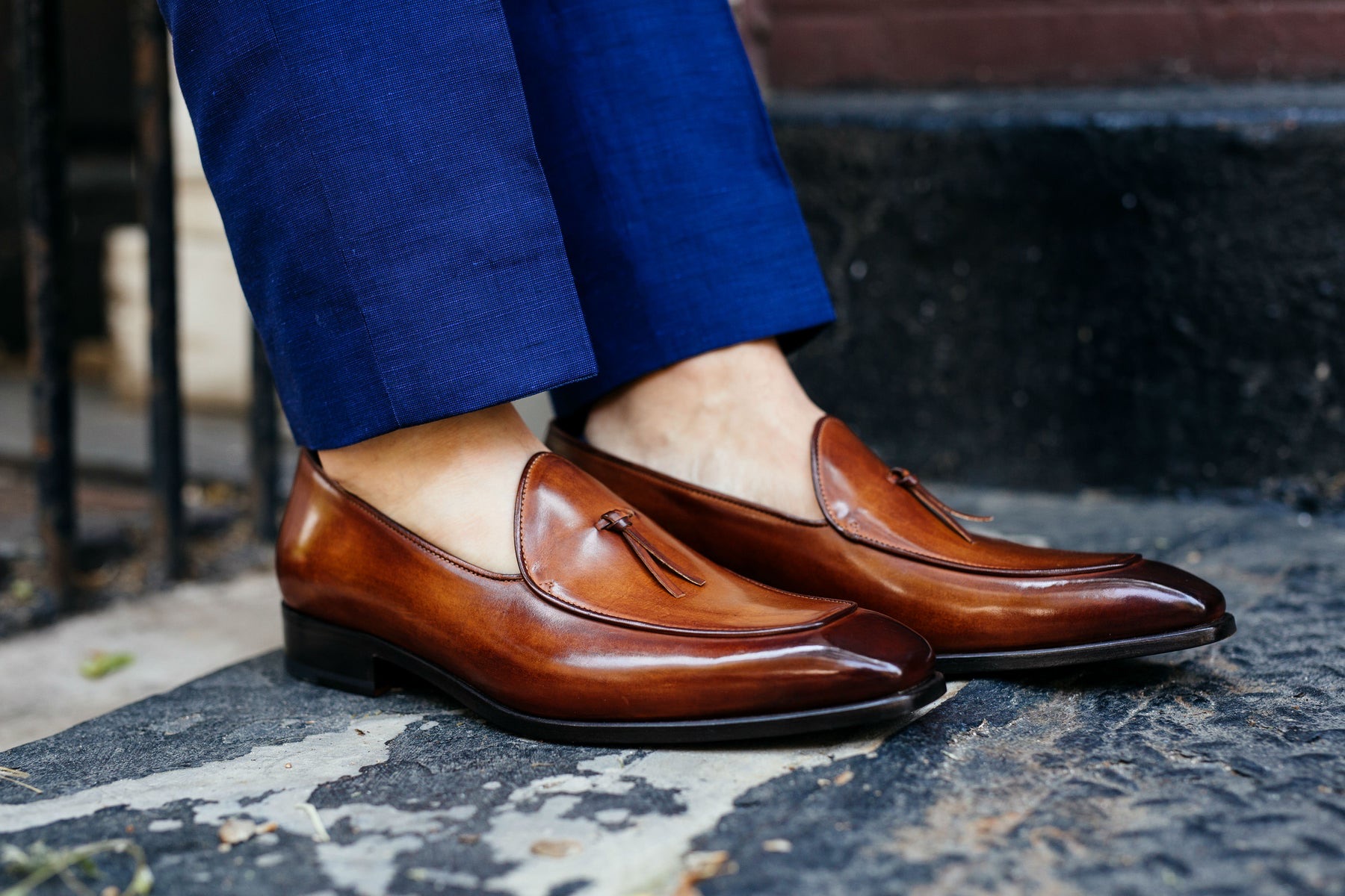 Benjamin's feet in Havana Brown Van Damme Belgian loafers on New York steps
